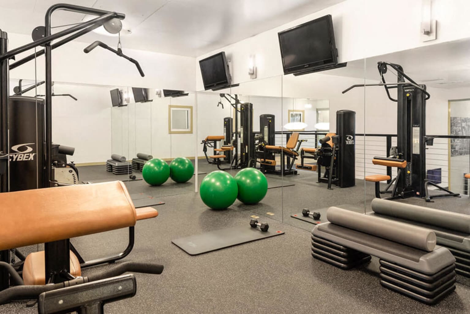 Spacious fitness center with a variety of equipment at Sofi Parc Grove in Stamford, Connecticut