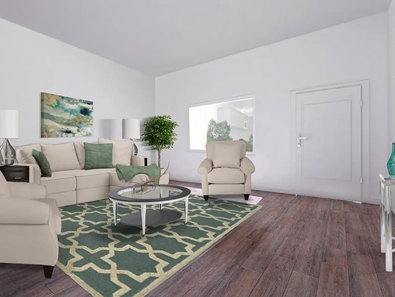 Spacious living room with couch at The Huntington in Morgan Hill, California