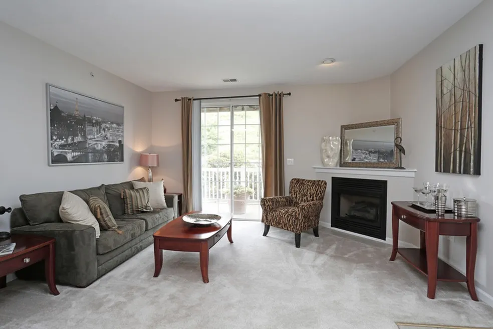 Spacious living room with sofa and chairs at Ventana Hills in Coraopolis, Pennsylvania