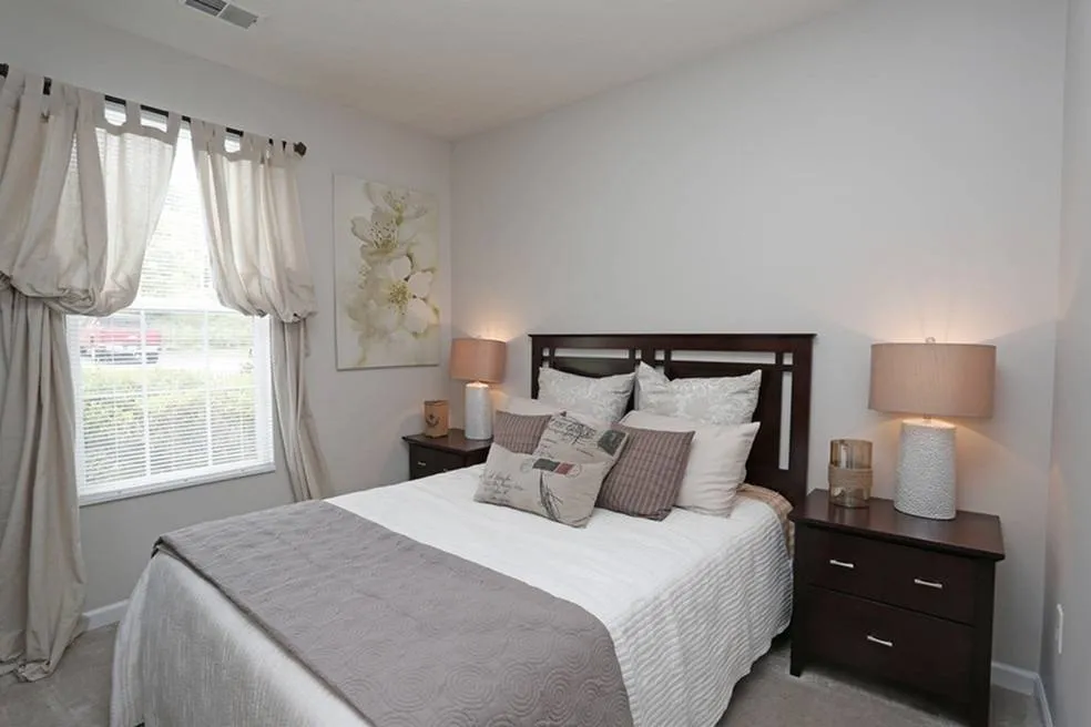 Bedroom with nightstand at Ventana Hills in Coraopolis, Pennsylvania