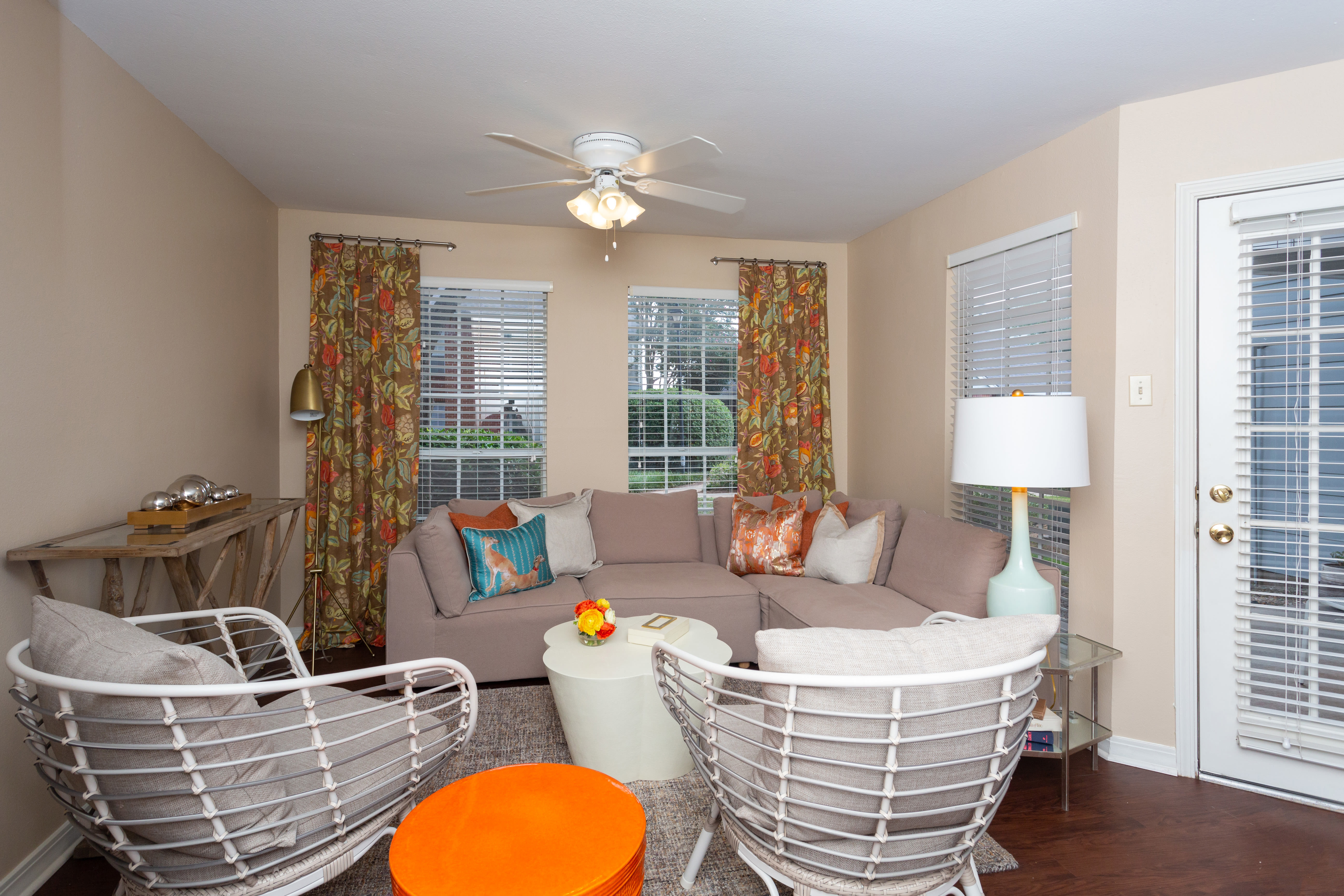 Living room with beautiful windows and curtains at Tallow Wood in Bossier City, LA