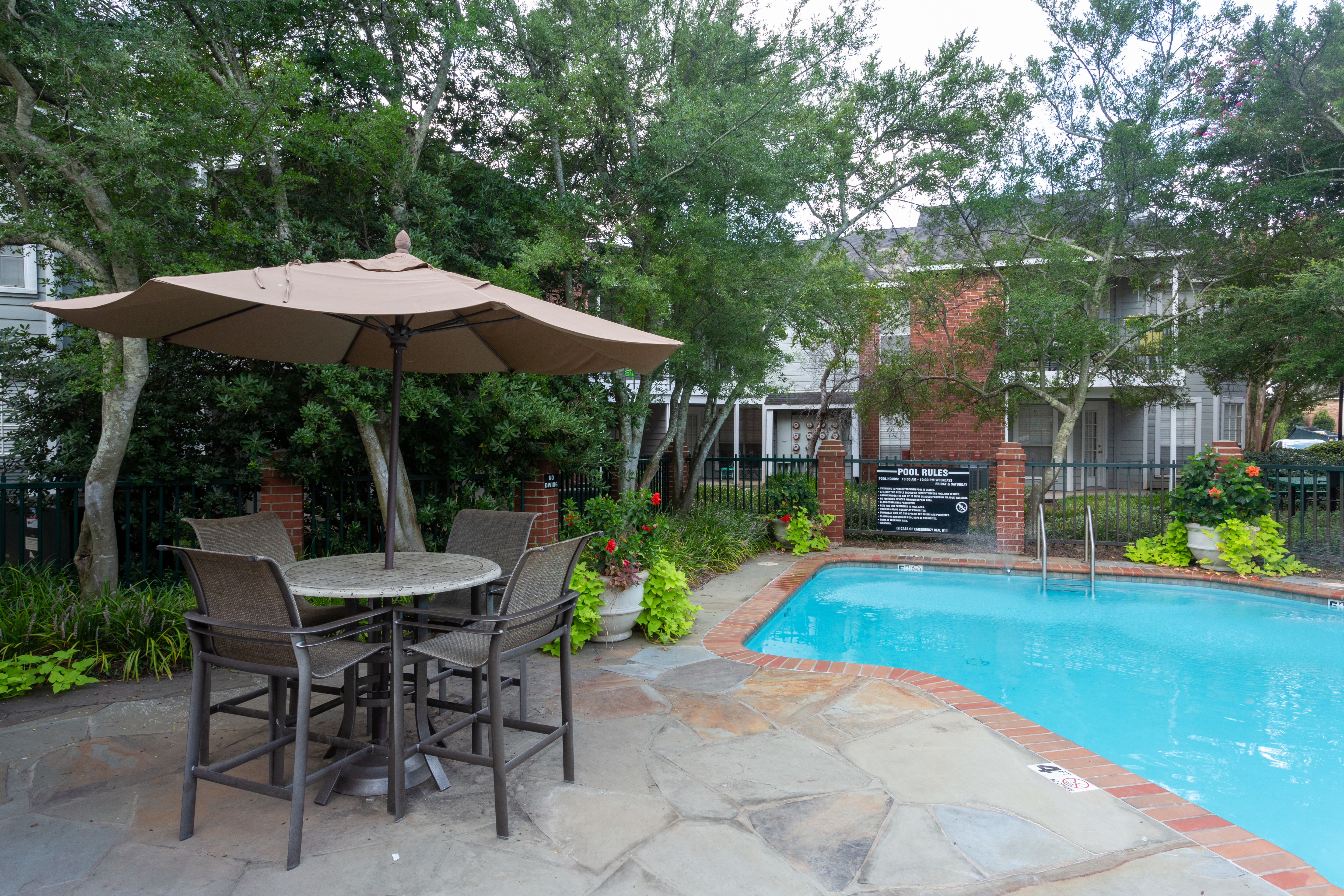 Pool with seating area at the side at Tallow Wood in Bossier City, Louisiana