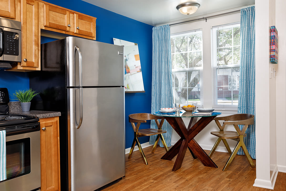 Eat-in-kitchen with stainless steel appliances at Northampton Reserve in Hampton, Virginia