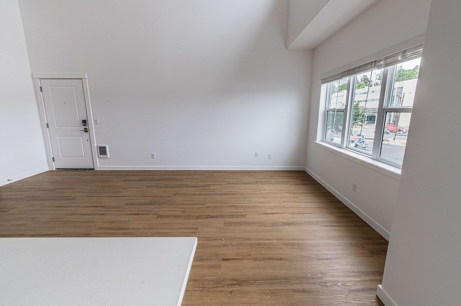 Spacious living room featuring hardwood floors at Pine View in La Pine, Oregon