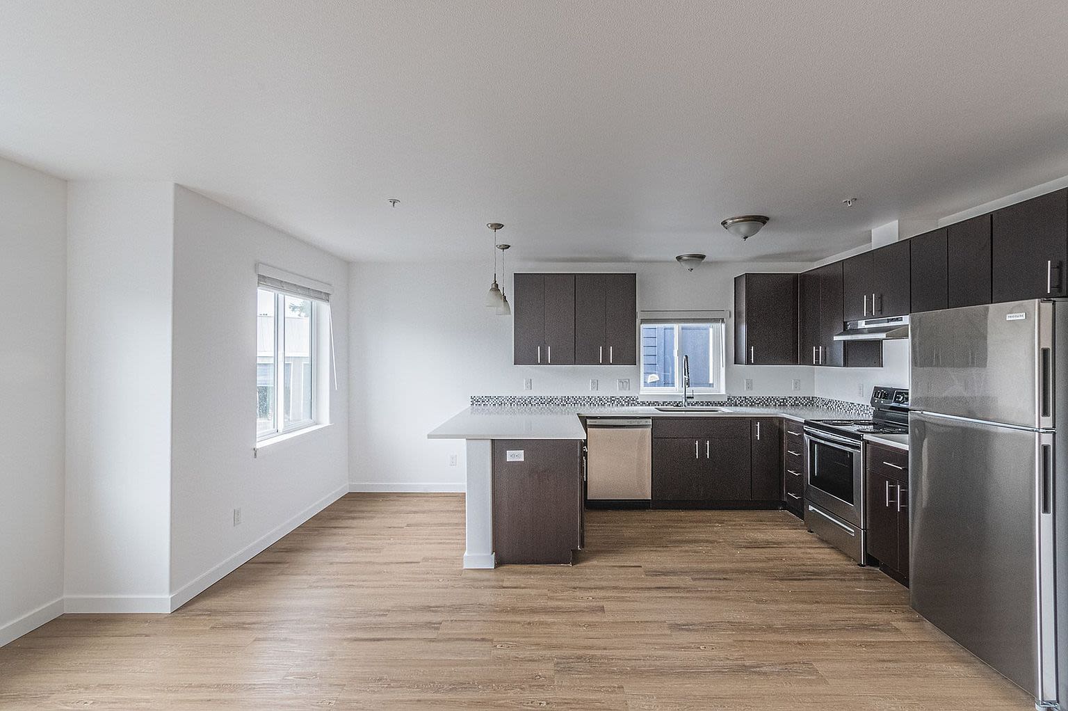 View of modern kitchen with breakfast area at Pine View in La Pine, Oregon