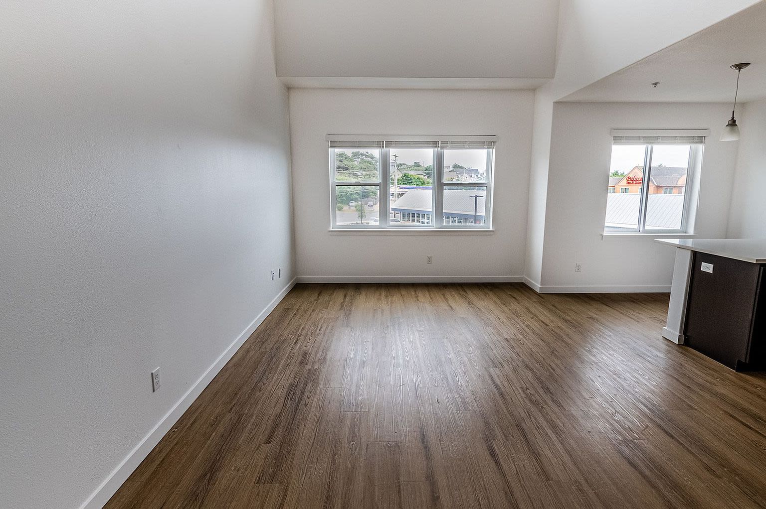 Living room with windows at Pine View in La Pine, Oregon
