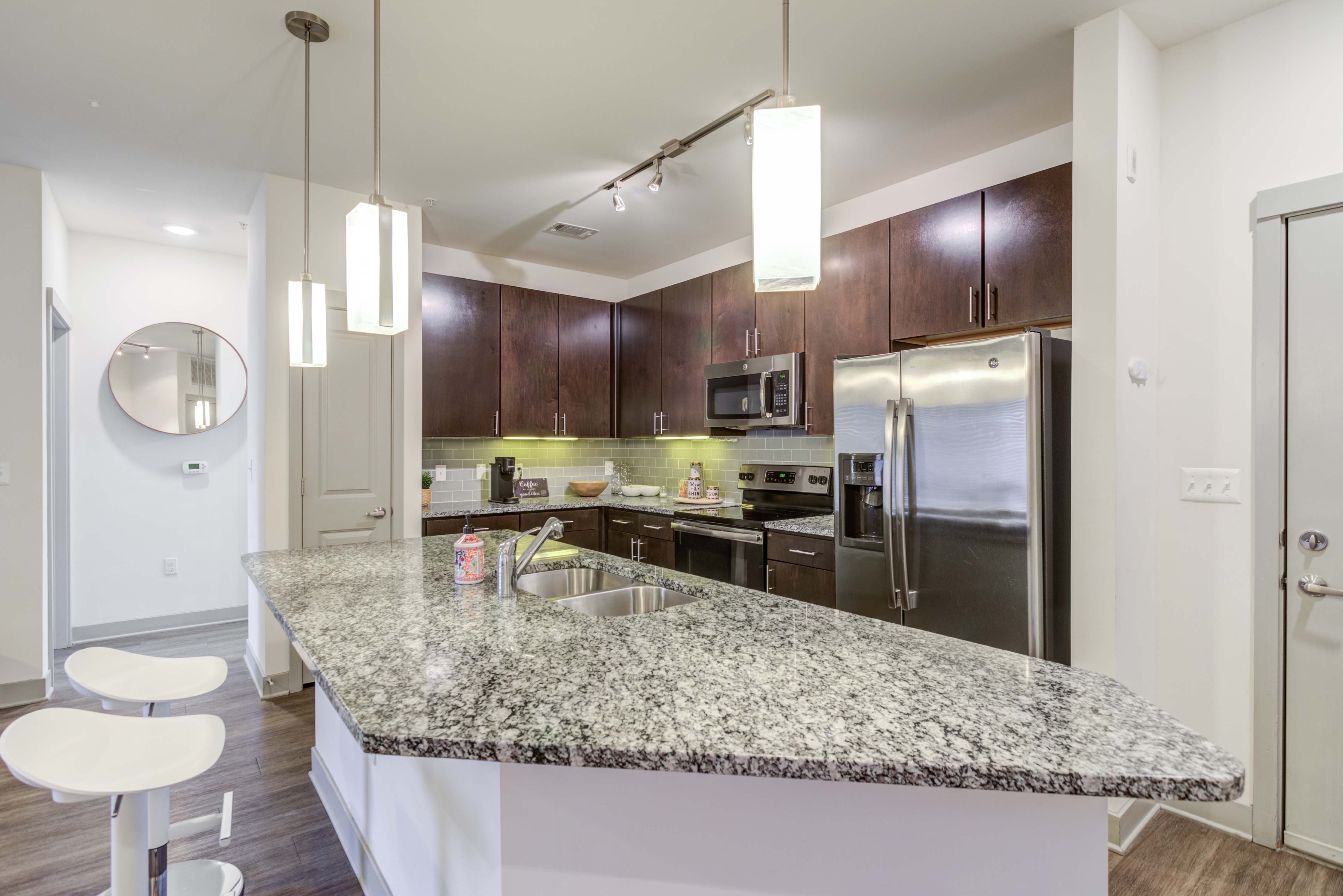 Apartment kitchen with marble countertop at The Carillon in Nashville,Tennessee