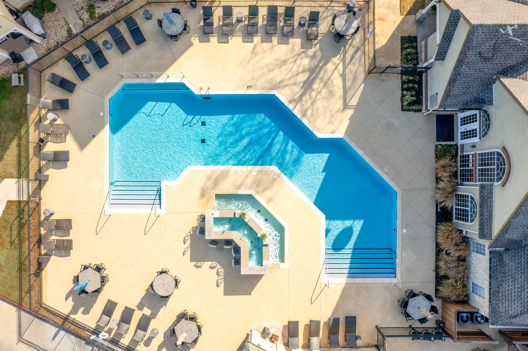 Top view of resort-style swimming pool at Mansions at Riverside in Tulsa, Oklahoma