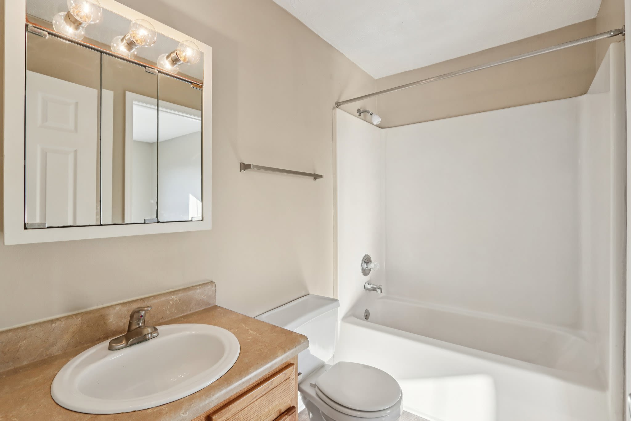 Bathroom with bath-tub at Fox Pointe Apartments in Columbus, Indiana