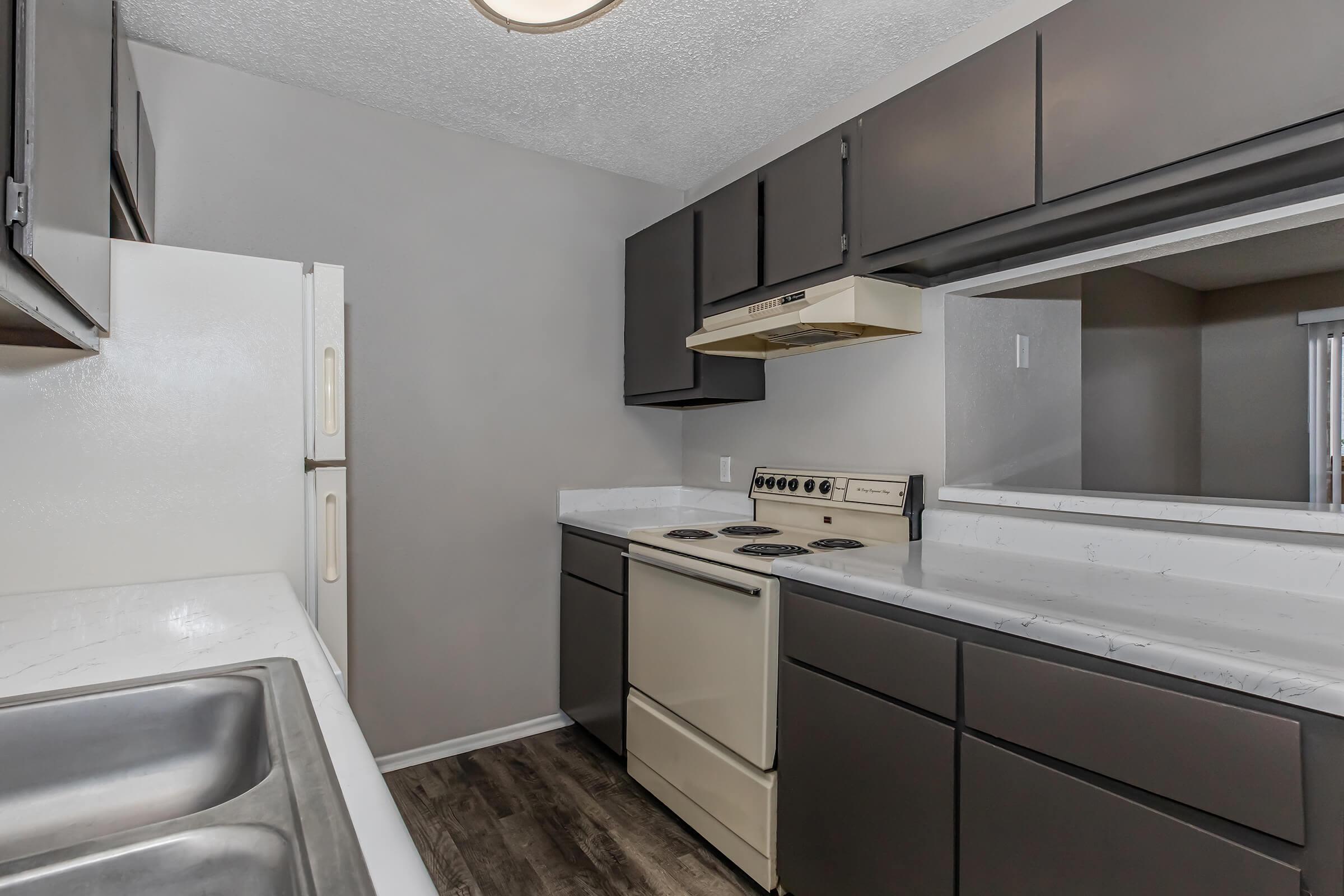 Modern kitchen at Wood River Apartments in Corpus Christi, Texas