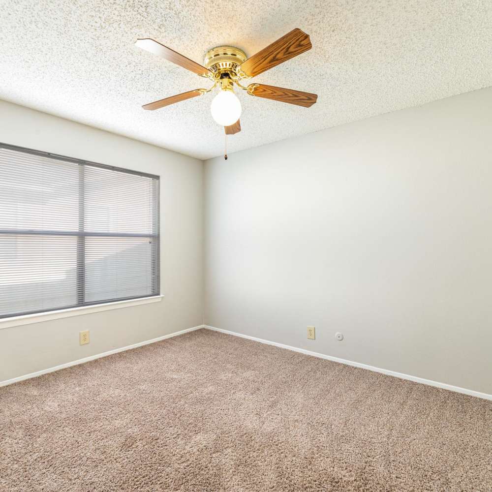 Ceiling fan with light fixture at The Camaron Townhomes & Flats in San Antonio, Texas