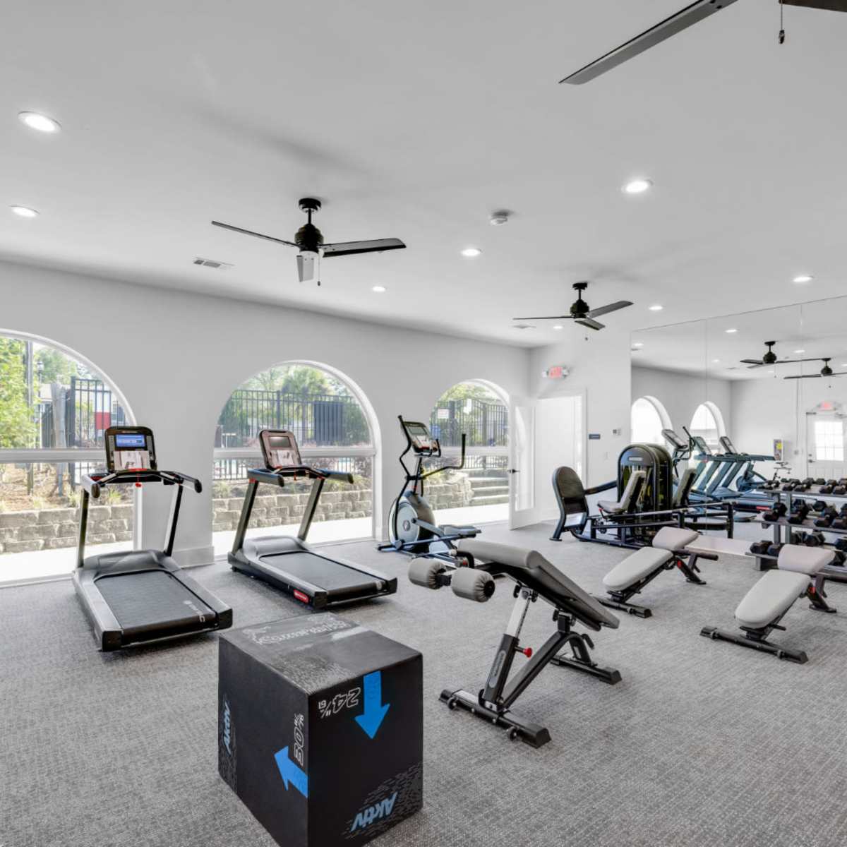 Fitness center with weights at Crescent Place in Savannah, Georgia