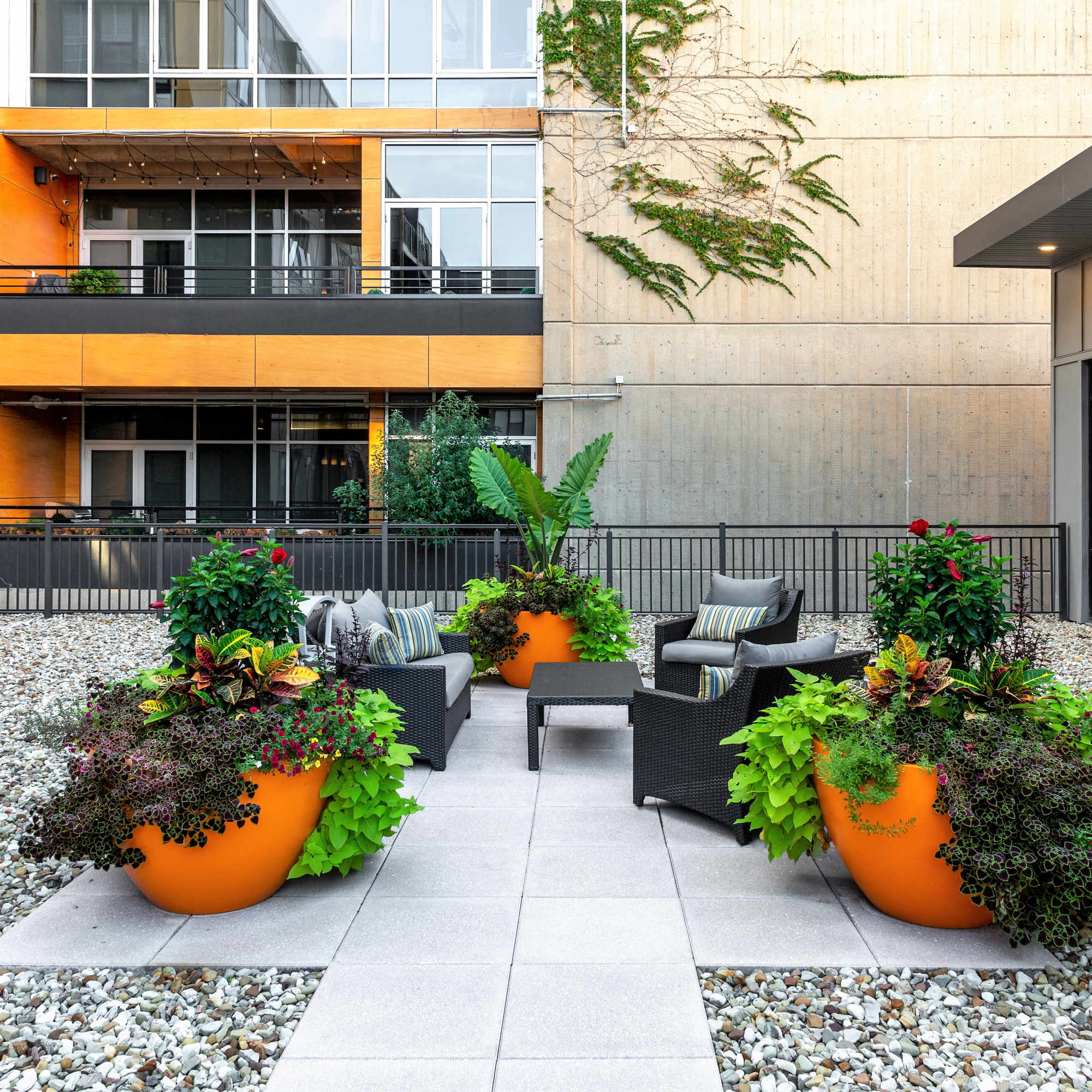 Seating area with planters and pavers at 223 E Town in Columbus, Ohio