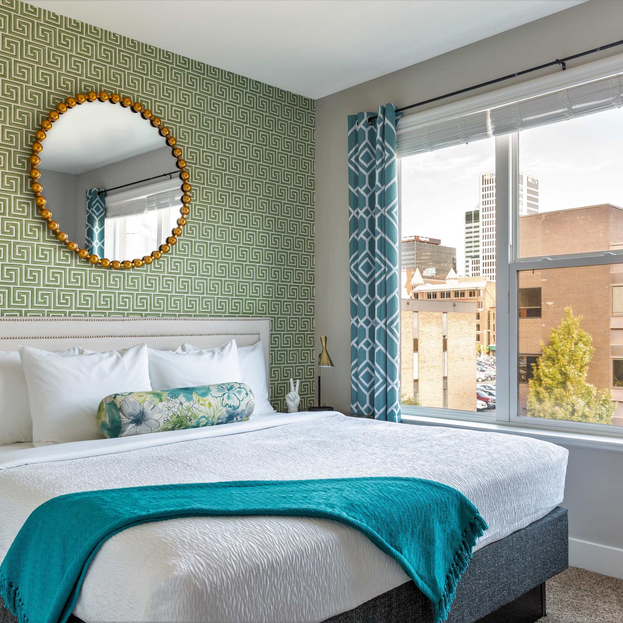 City buildings visible through the window at 223 E Town in Columbus, Ohio