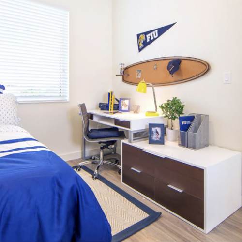 Student bedroom with desk and decor at Bayview Student Living in North Miami, Florida