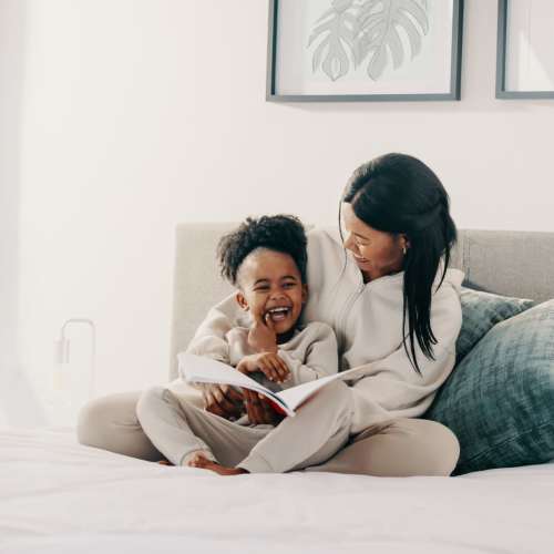 Resident with her child at Diggs Circle Townshomes in La Plata, Maryland