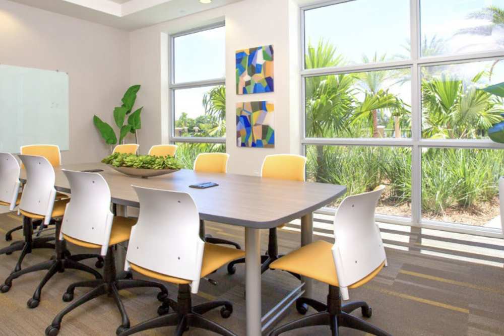 Conference room with modern seating at Bayview Student Living in North Miami, Florida