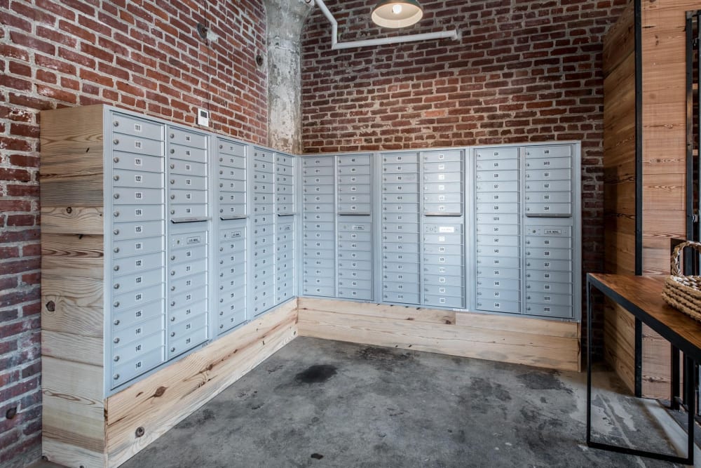 Mailboxes against a brick wall at Brush Factory Lofts in Philadelphia, Pennsylvania