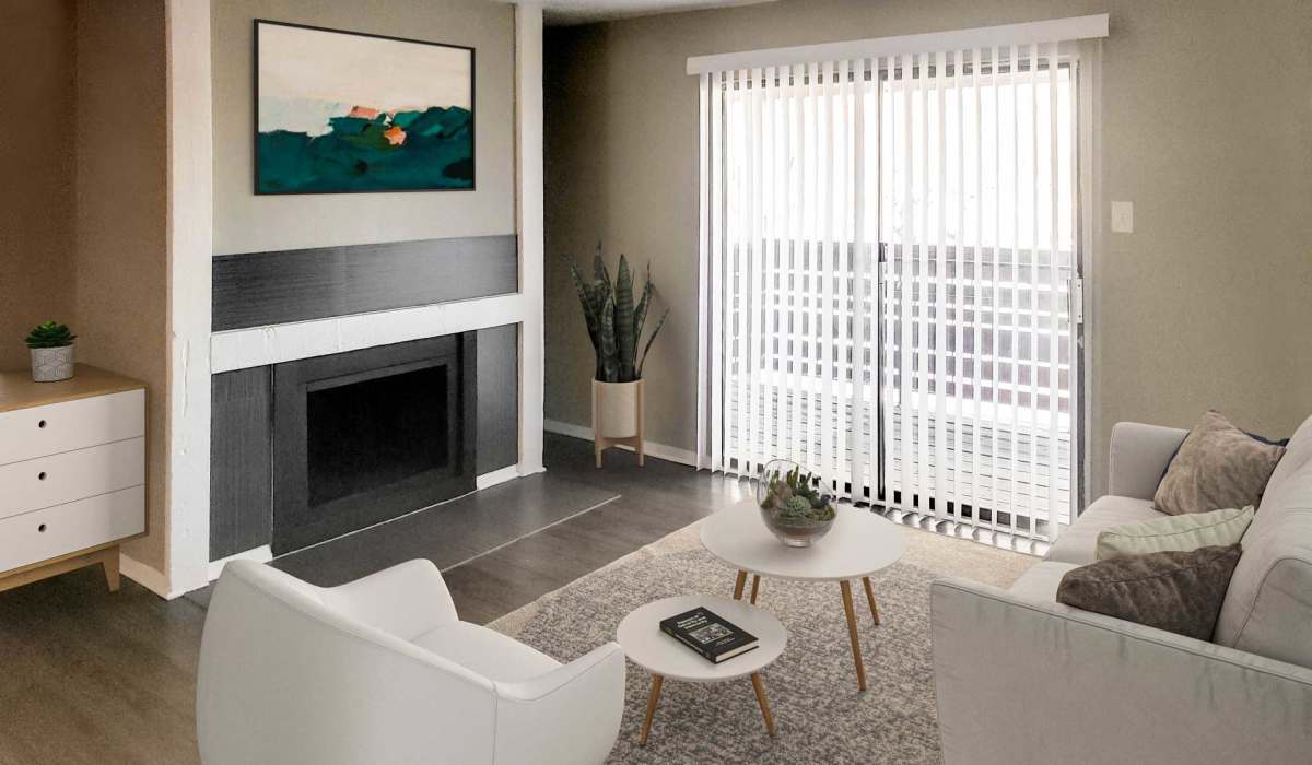 Modern living room with cozy seating at Riatta Ranch Apartments in Abilene, Texas