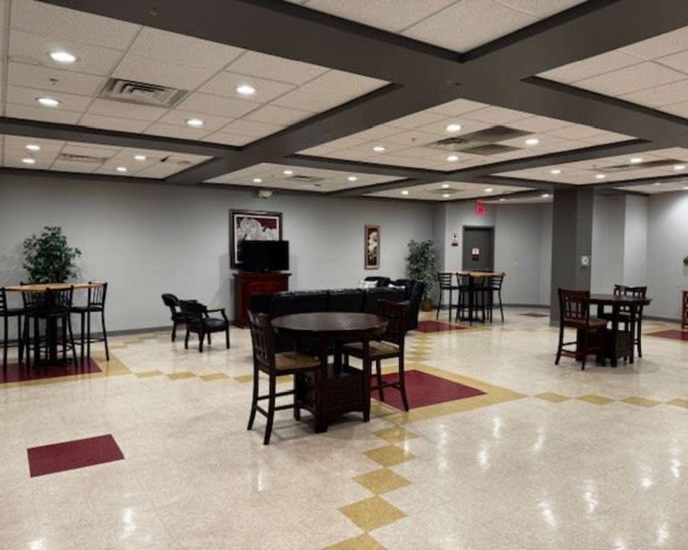 Community lounge area with seating at The Roosevelt in Cedar Rapids, Iowa