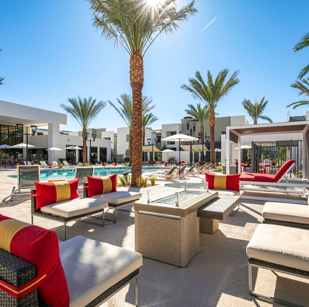 Bright pool area with lounge seating at Revolution in Henderson, Nevada