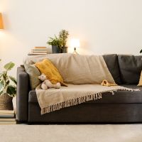 Cozy living room with comfortable seating at Continuum Apartments in Las Vegas, Nevada