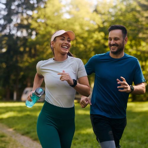 Residents jogging on a sunny day near Crystal Commons Townhomes in Gates, New York
