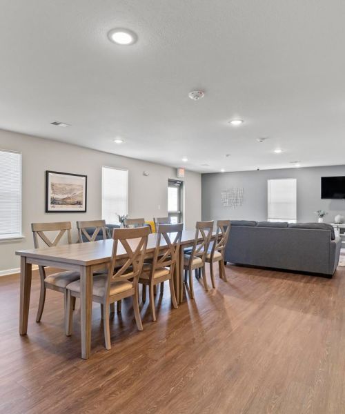 Dining area with LVT flooring at Anderson Greene II in Cedar Rapids, Iowa