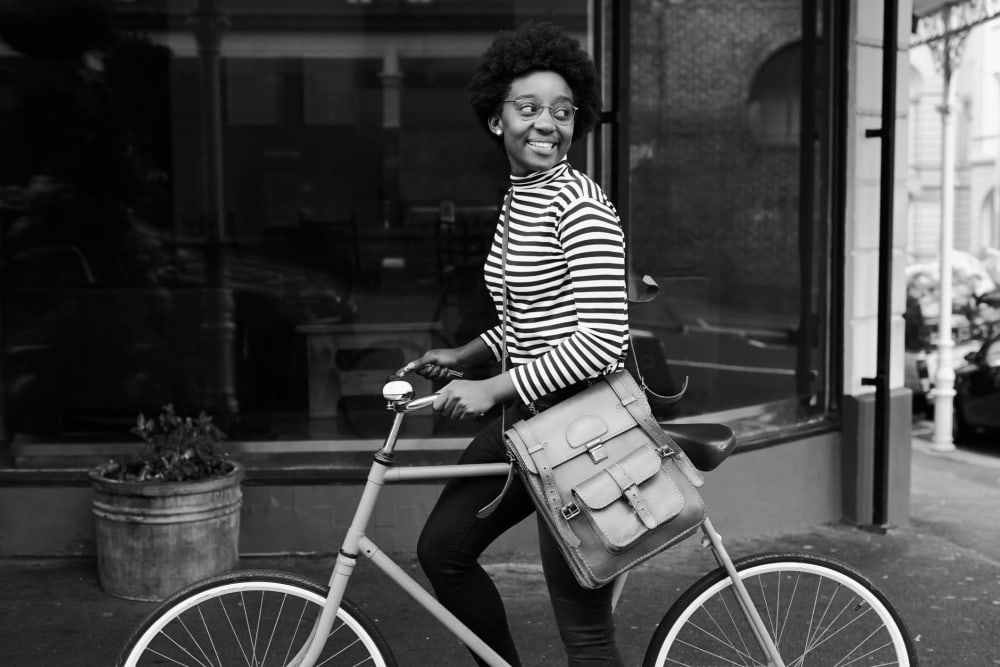 Resident riding her bike in Chicago, Illinois near INFINITE