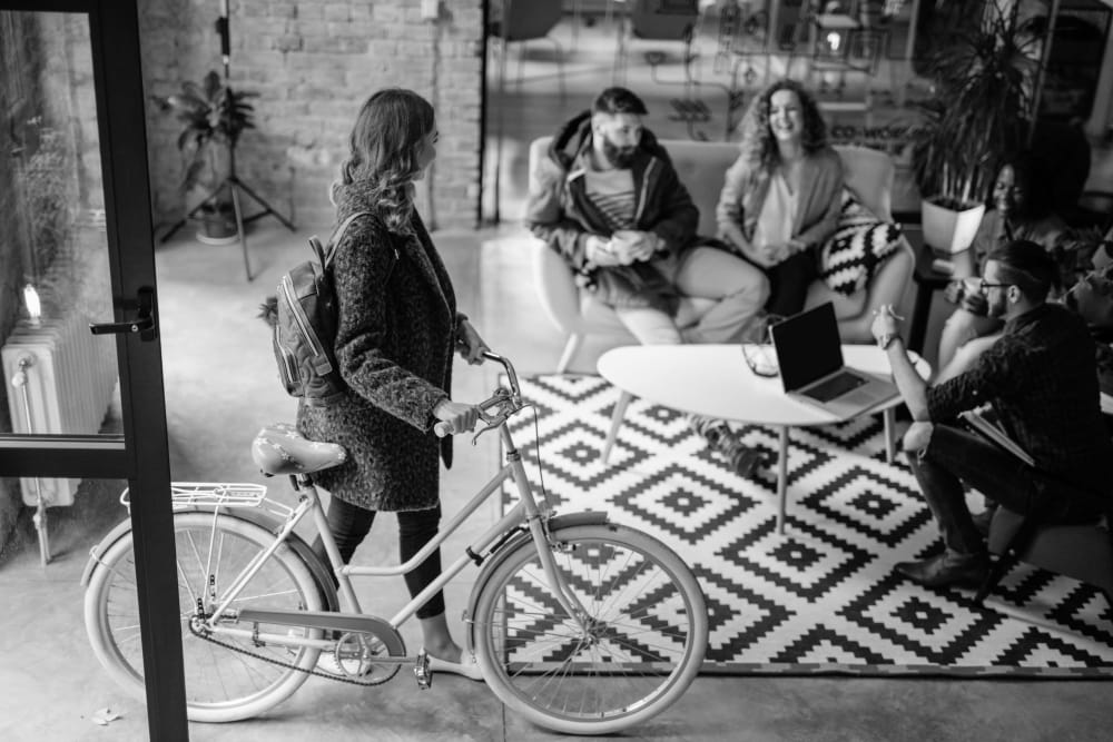 Resident walking her bike near Social 28 in Gainesville, Florida