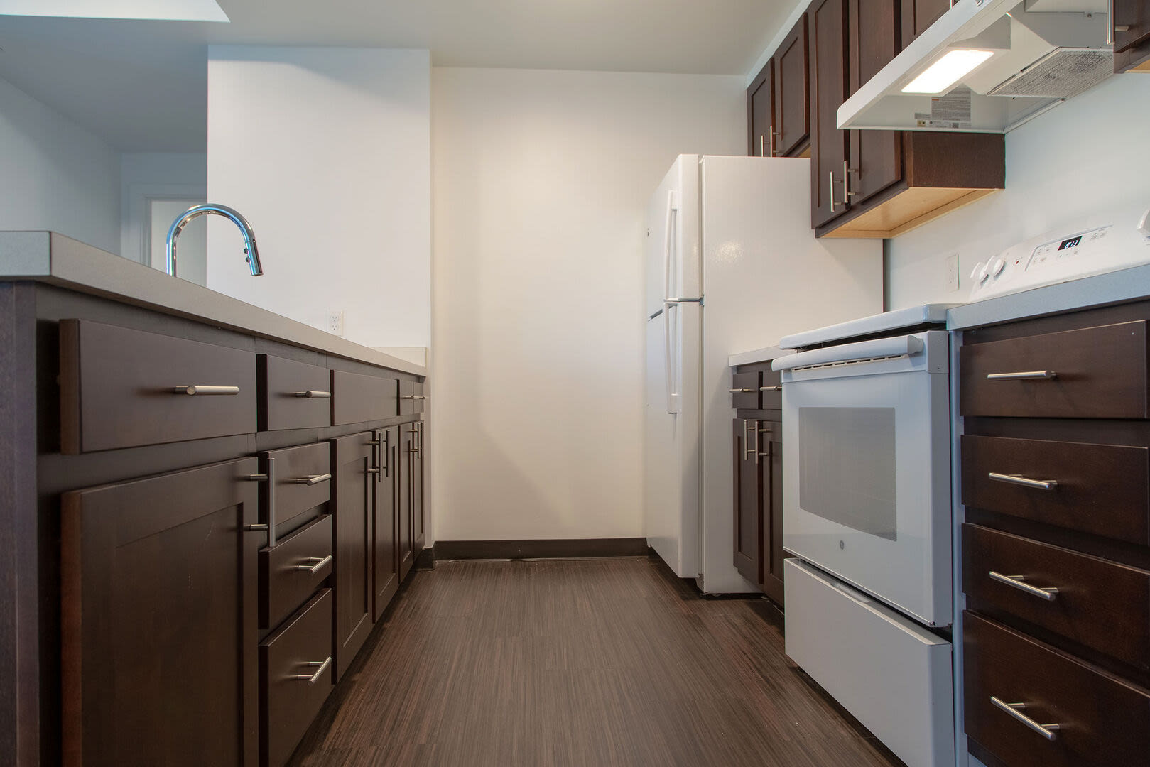 Kitchen with hard wood flooring at 61 Heath in Jamaica Plain, Massachusetts