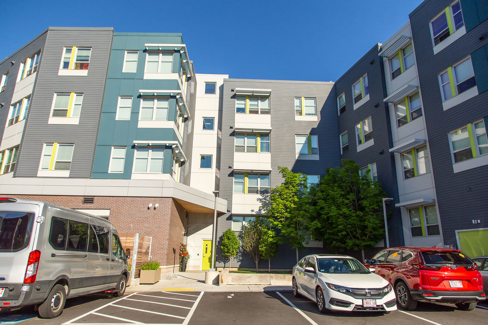 Community exterior view with car parking space at 61 Heath in Jamaica Plain, Massachusetts