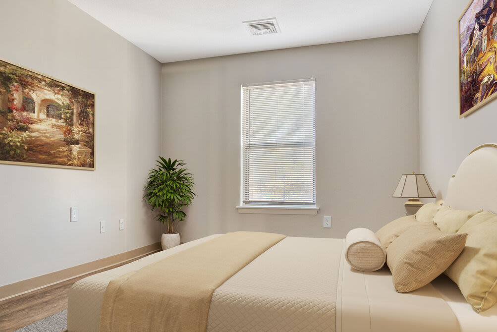 Cozy bedroom with a large window at 840 County in Taunton, Massachusetts
