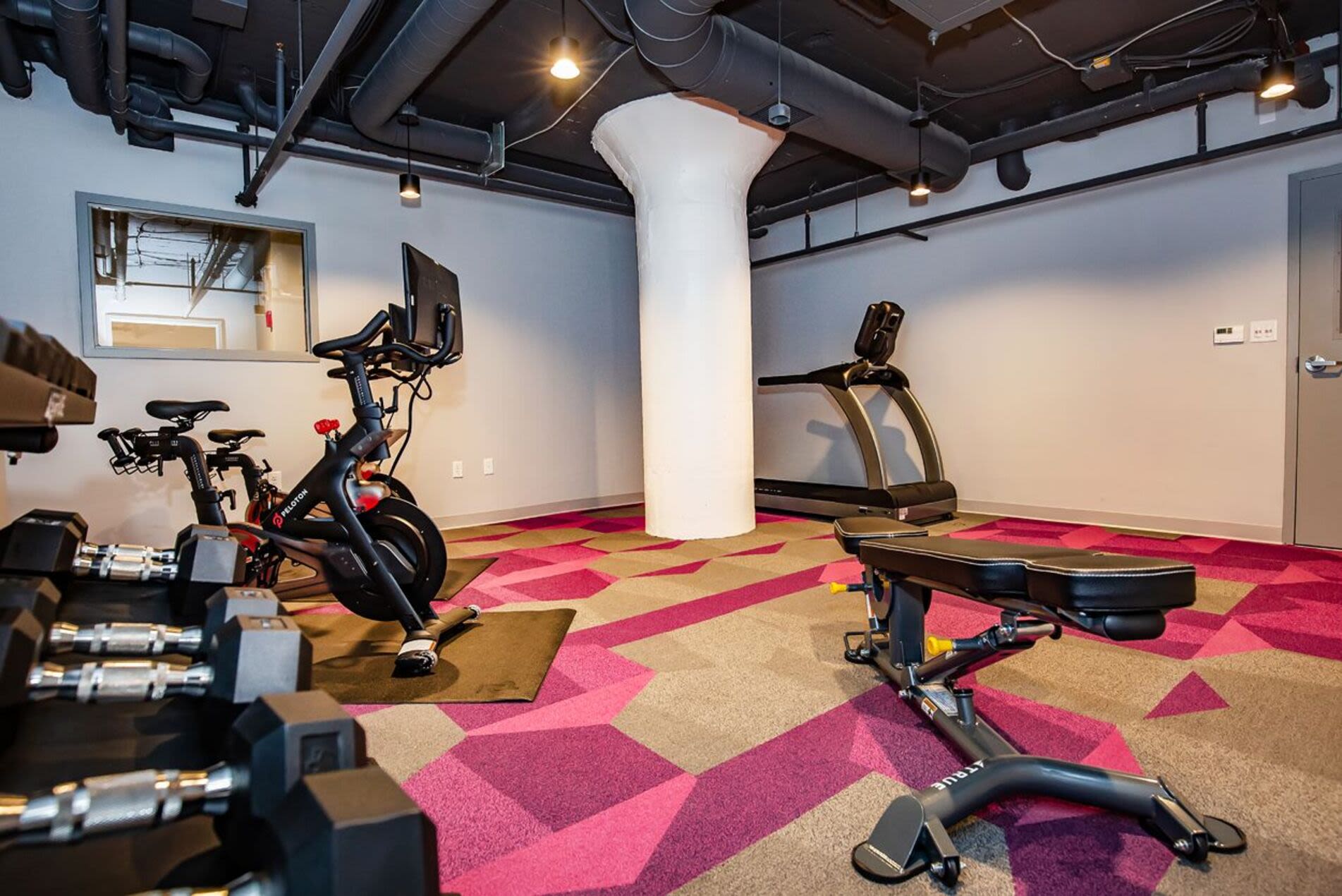 Well-equipped gym at 98 Essex in Haverhill, Massachusetts