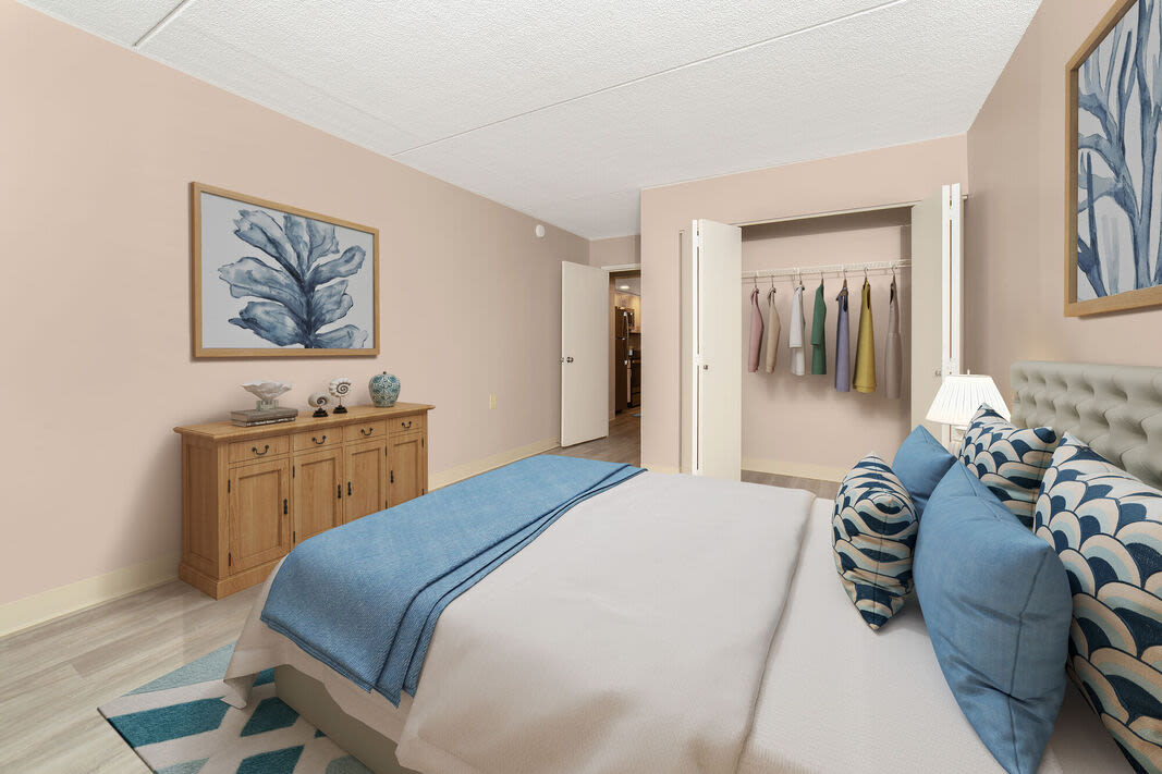 Bedroom with a walk-in closet at Anchors Weigh in Chelsea, Massachusetts