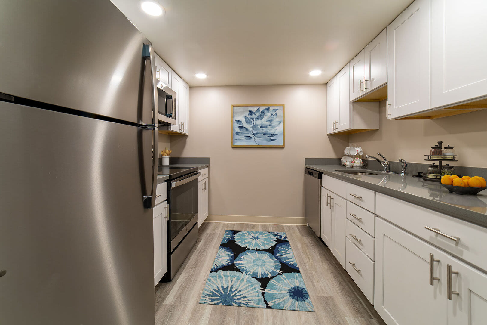 Kitchen with stainless-steel appliances at Anchors Weigh in Chelsea, Massachusetts