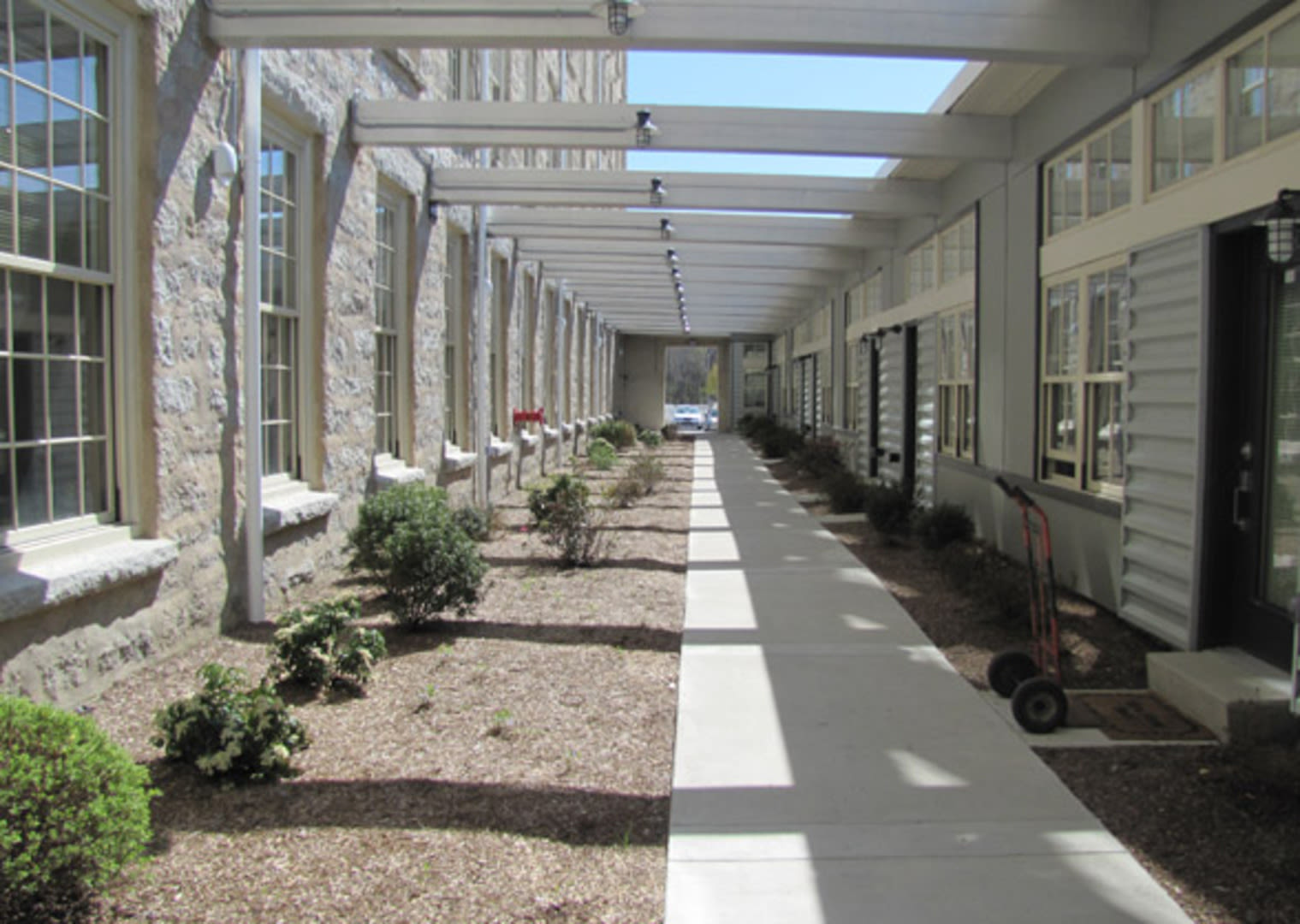 Apartment sidewalk at Bourne Mill in Tiverton, Rhode Island