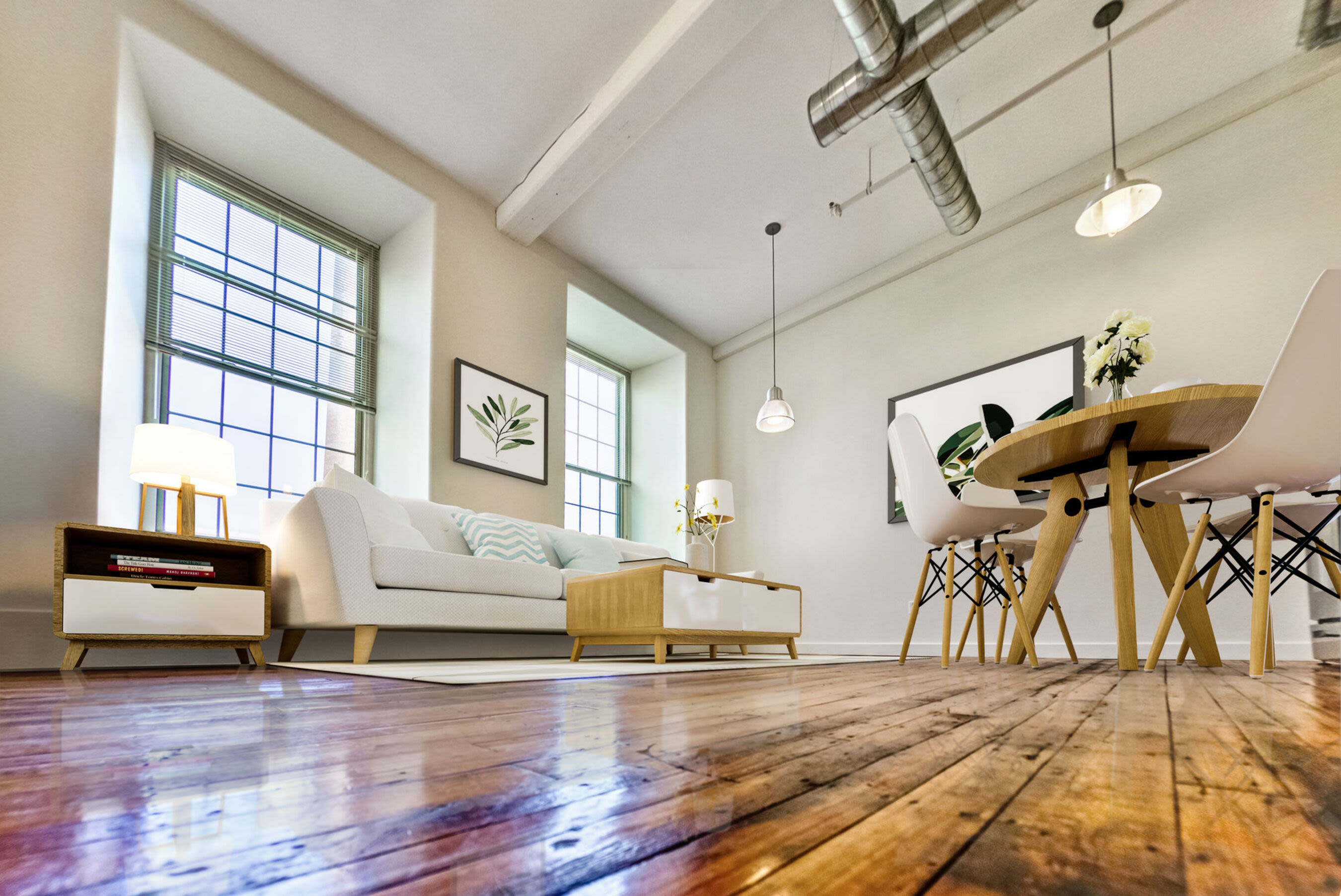 Living room with hardwood flooring at Bourne Mill in Tiverton, Rhode Island