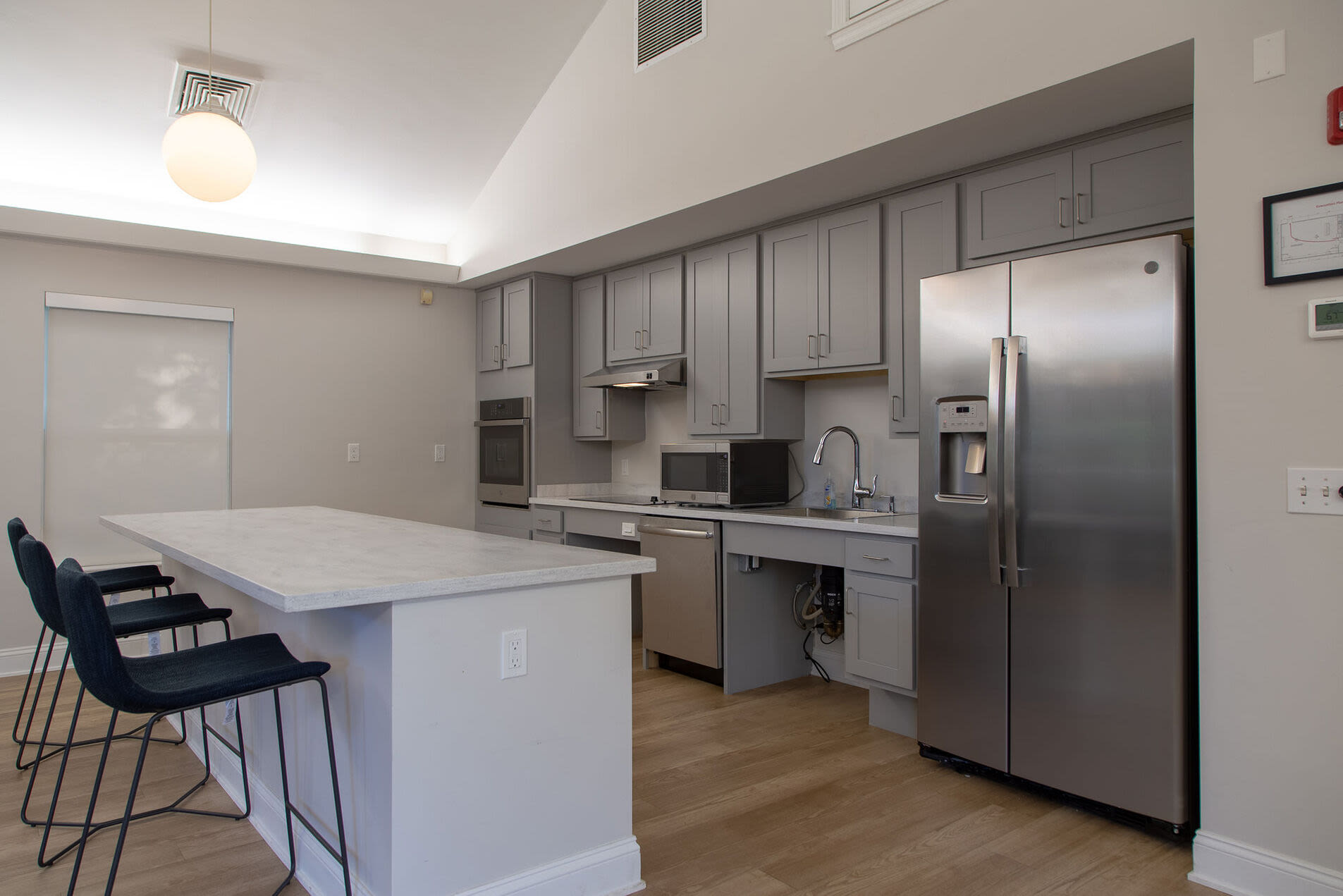 Fully equipped kitchen in the community room at Brook Avenue Apartments in Roxbury, Massachusetts