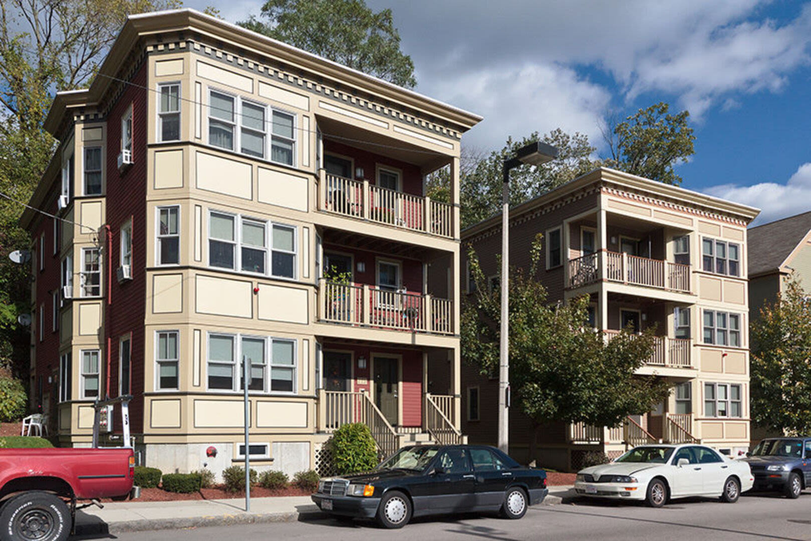 Entrance of apartments with car parking at Catherine H. Gallagher Coop in Jamaica Plain, Massachusetts