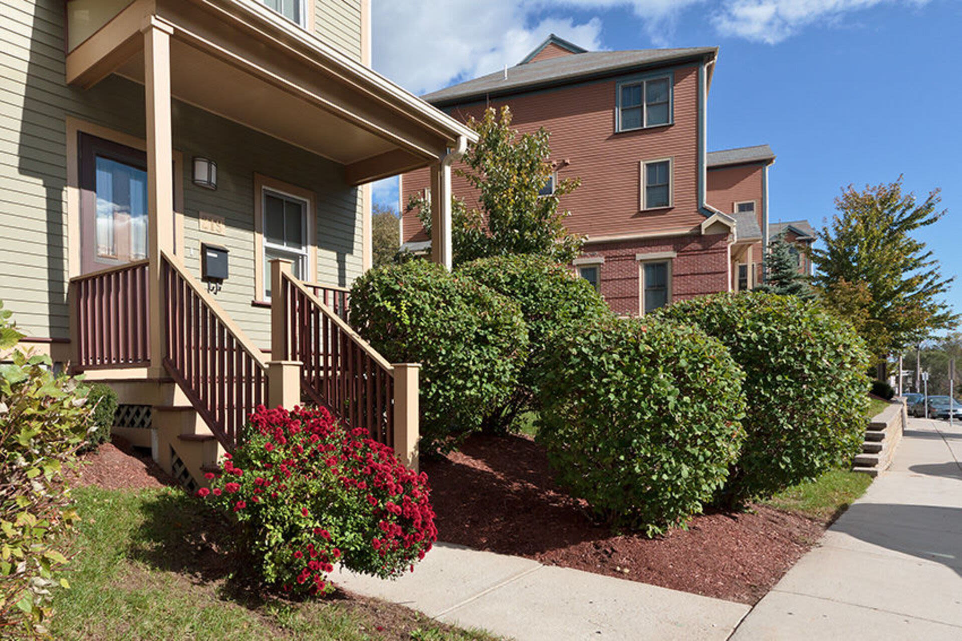 Entrance of the apartment with plants at Catherine H. Gallagher Coop in Jamaica Plain, Massachusetts