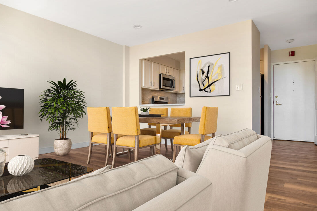 Living space with a view of the dining room Christopher Columbus Plaza in Boston, Massachusetts