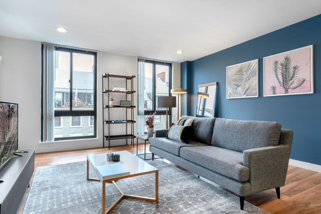 Living space with blue accents Christopher Columbus Plaza in Boston, Massachusetts