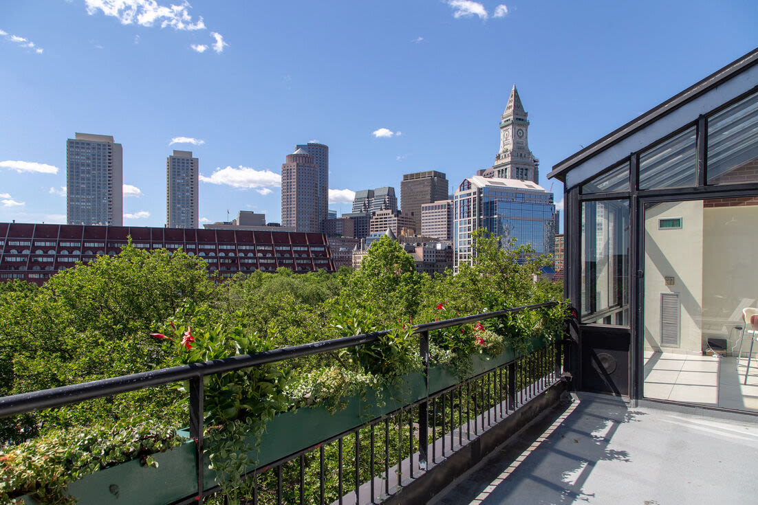 Balcony with a view of landscaping at Christopher Columbus Plaza in Boston, Massachusetts