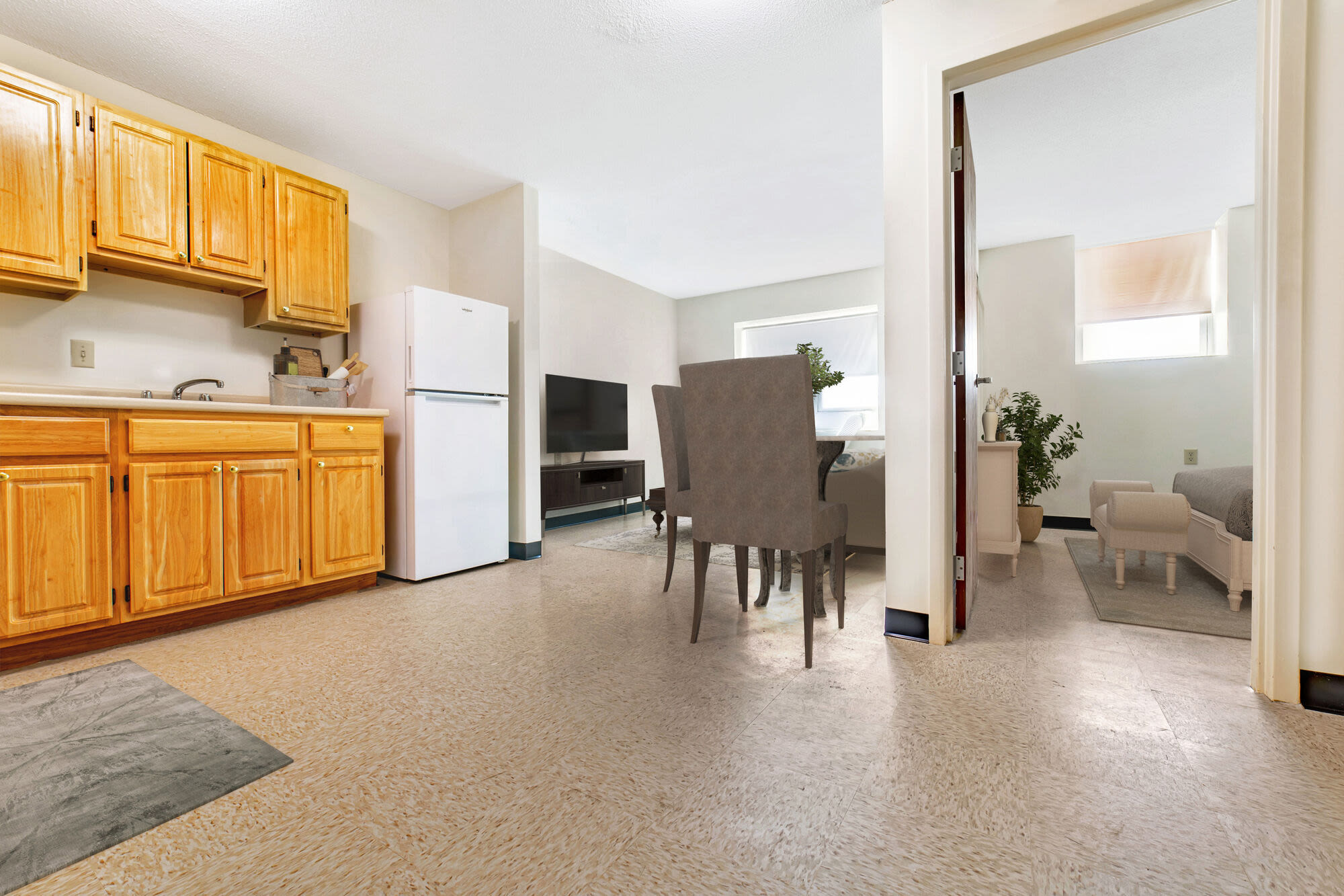 Kitchen with dining table at John Boyle O'Reilly Apartments in South Boston, Massachusetts