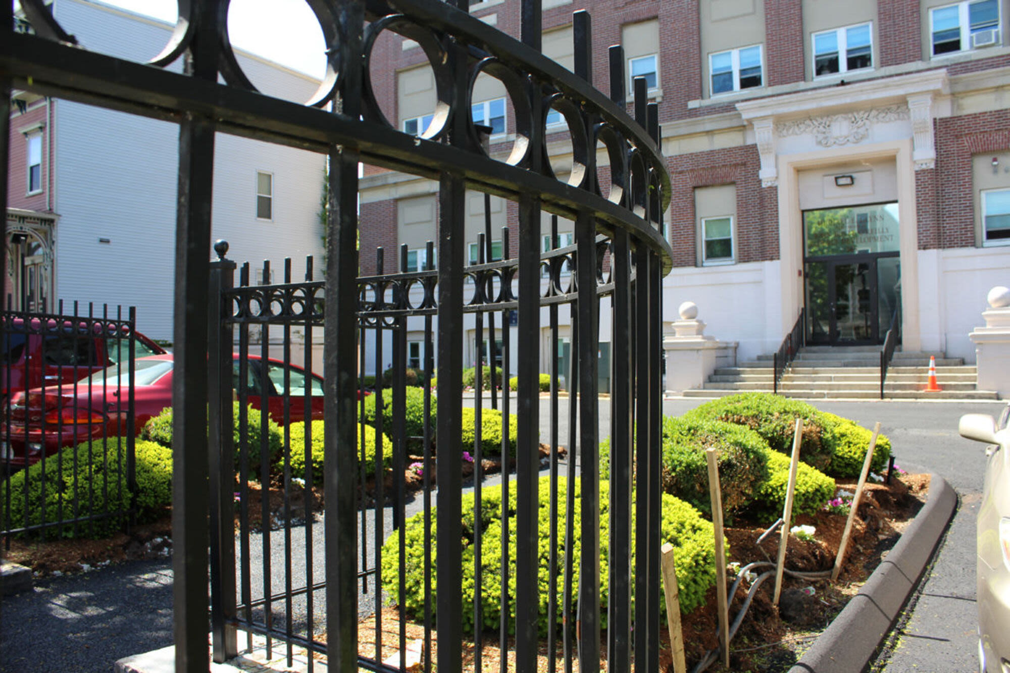 Greenery front of apartments at John Boyle O'Reilly Apartments in South Boston, Massachusetts