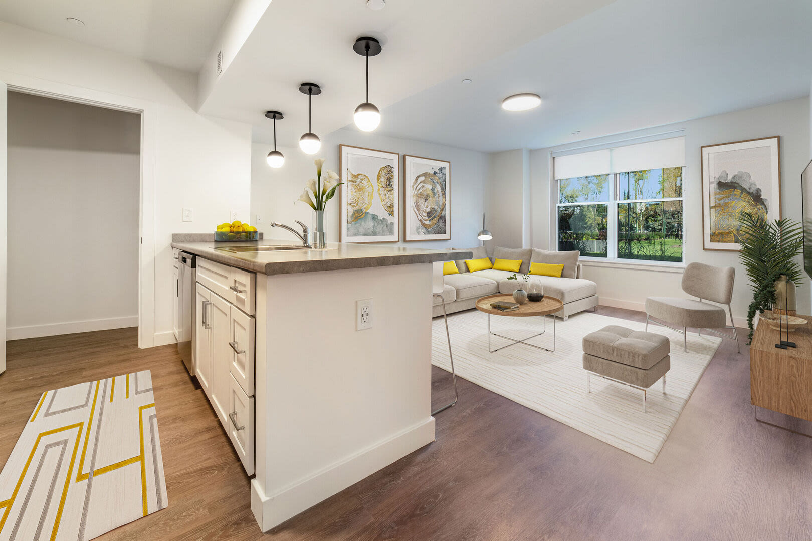 Breakfast bar and view of living room from kitchen at Parkway 1208 in West Roxbury, Massachusetts