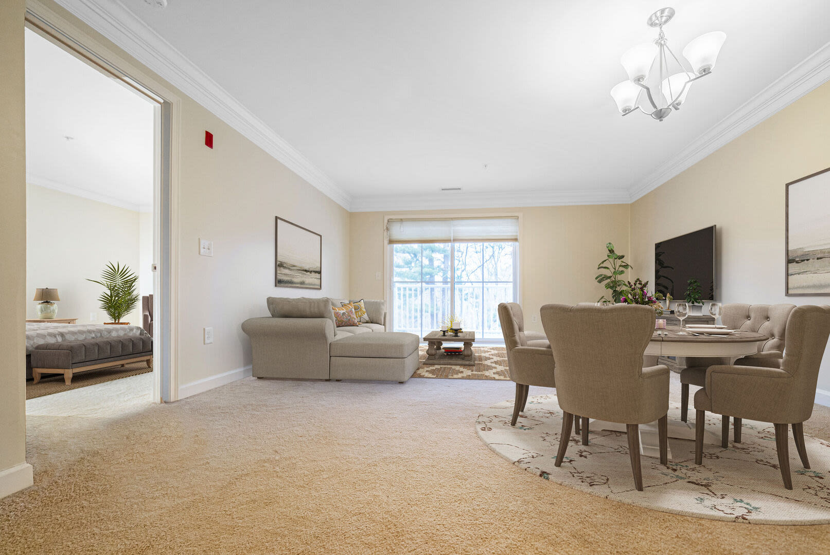 Living room with large window at Sterling Place in Lakeville, Massachusetts