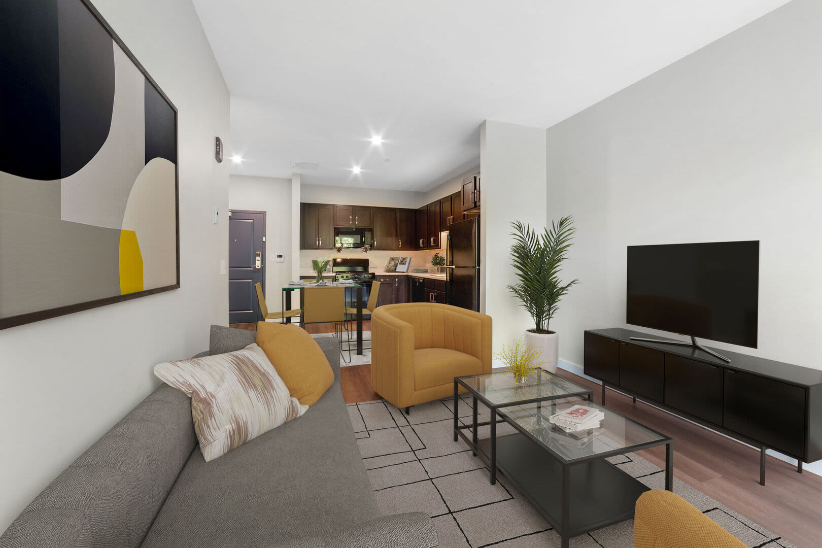 Spacious living room with coffee table and couch at Solara in Tiverton, Rhode Island