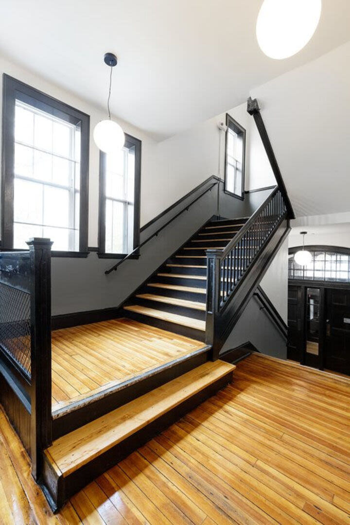 Stair-case of the clubhouse at The Mcelwain School Apartments in Bridgewater,Massachusetts